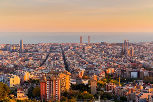 Barcelona skyline at sunset with the Sagrada Família